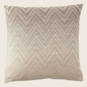 Neutral chevron patterned pillow with tag on white background. - hover