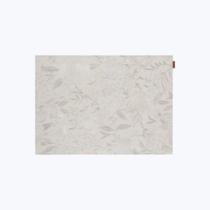 Monochromatic floral pattern fabric with subtle elegance and classic design.