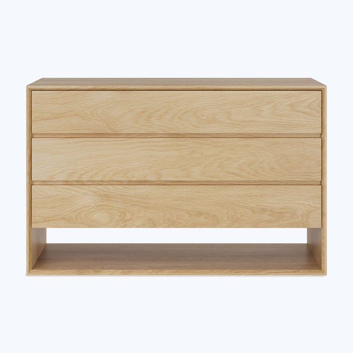 Modern minimalist dresser with natural wood finish, clean lines design.