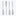 Four metal spatulas with cylindrical handles on neutral background.