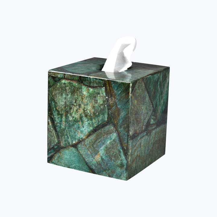 Decorative tissue box cover with marbled texture design.