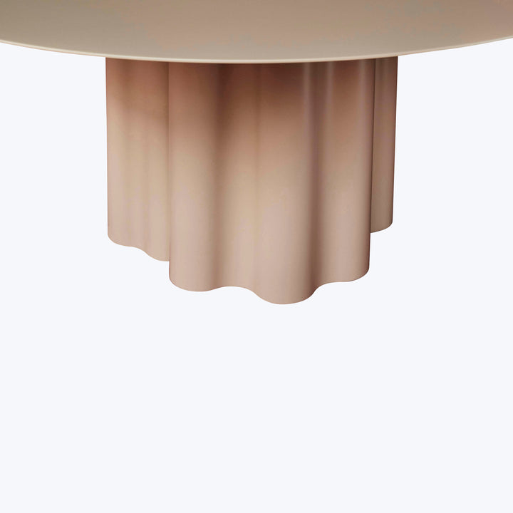 Elegant round table with scalloped edge and accordion-like base.