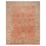 Antique ornate rug with intricate floral and geometric designs.
