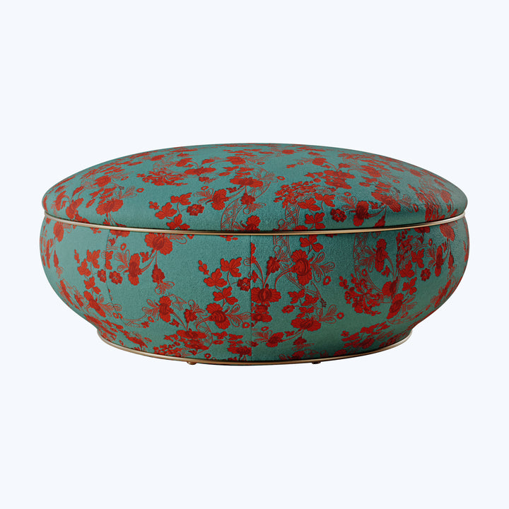 Colorful split-design cushion with floral pattern on turquoise background, versatile storage.