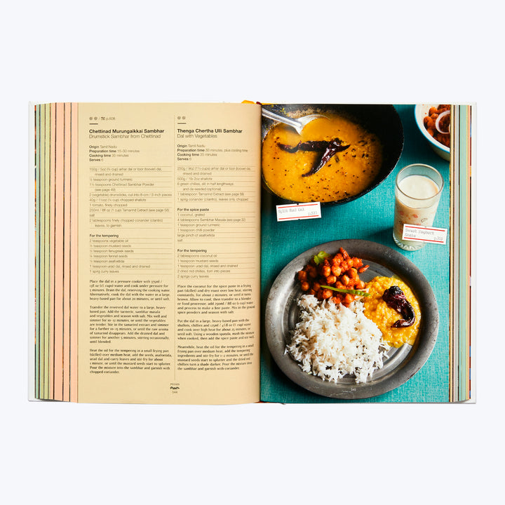 Cookbook with South Indian recipes, dishes, and buttermilk setup.