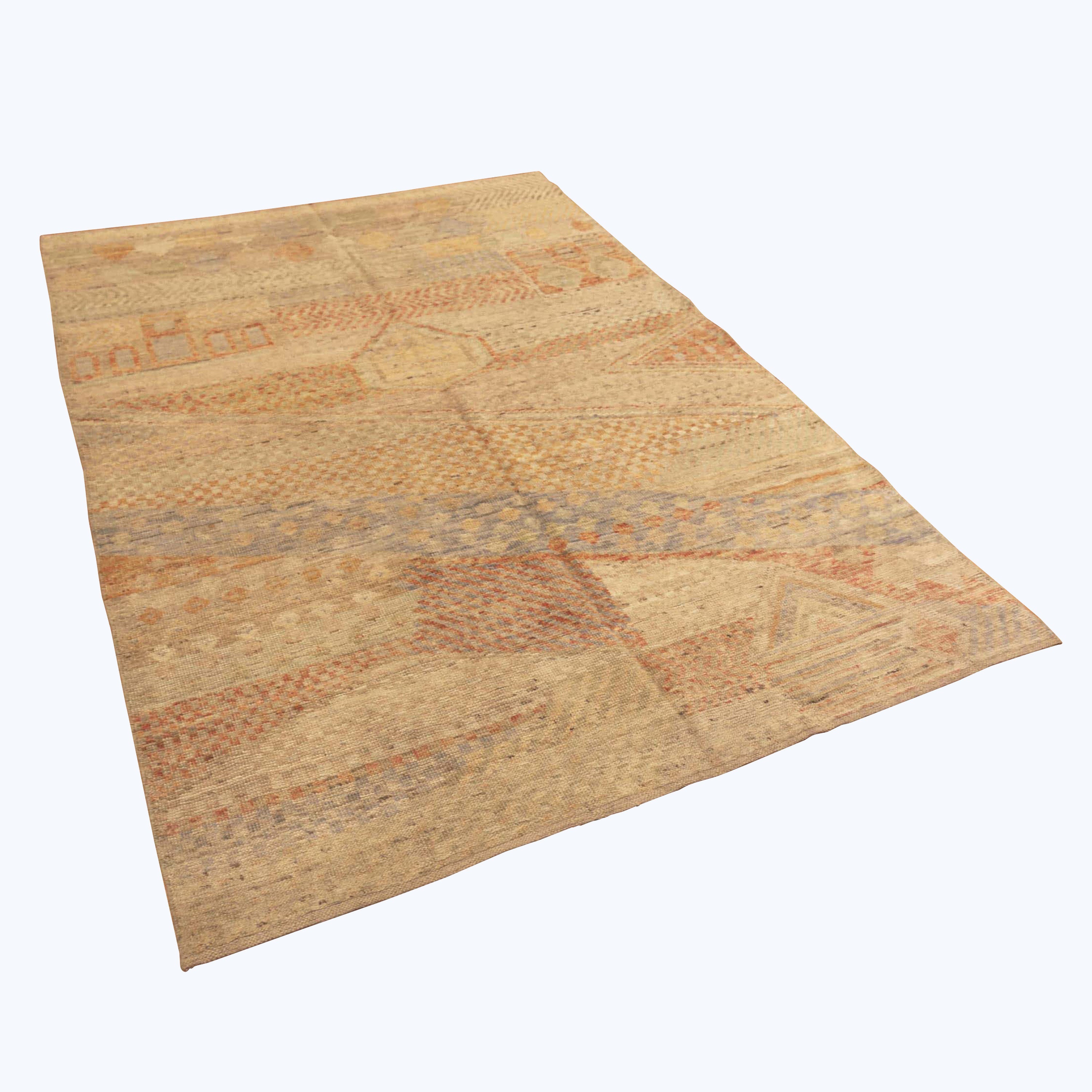 Rectangular area rug with geometric pattern in muted tones.