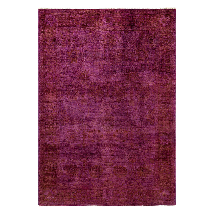 Modern purple rectangular rug with faded traditional motif design.