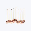 Lit menorah with nine candles used in Jewish festival Hanukkah.