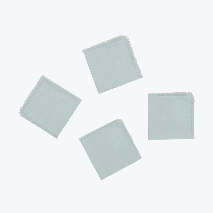 Five pale blue fabric swatches arranged in random pattern.