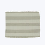 Beige striped fabric with textured weave and scalloped edge detail.