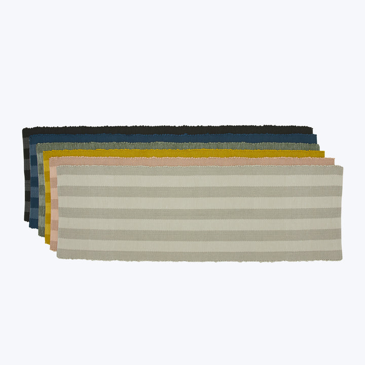 Assorted striped fabric swatches in various colors and textures.