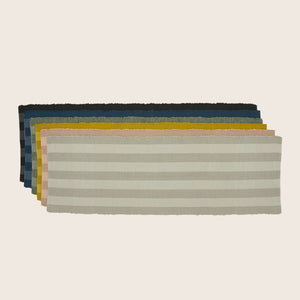 Rectangular textile object with alternating beige stripes and scalloped border. - hover