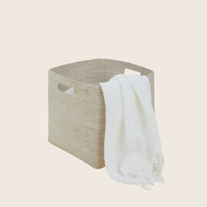 Minimalistic square storage basket in natural beige with cut-out handles. - hover