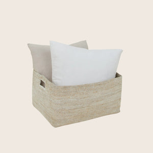 Minimalist beige woven fabric storage basket with cut-out handles. - hover