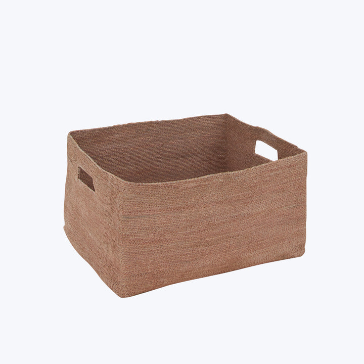 Rectangular woven storage basket in brown with cut-out handles.