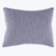 Square lavender pillow with textured fabric in knitted ribbed pattern.