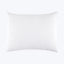 White textured pillow with raised ripple pattern on isolated background.