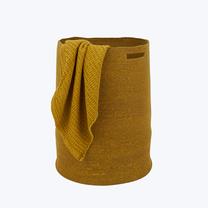 Mustard yellow textured cylinder with knitted cloth, ambiguous purpose object.