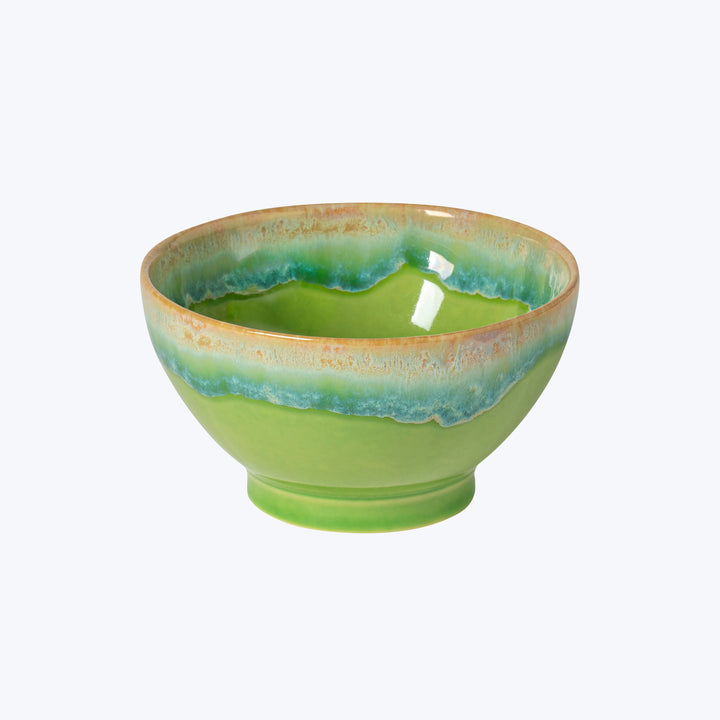 Handcrafted ceramic bowl with blended green and blue glaze finish.