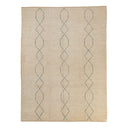 Modern neutral rug with geometric diamond pattern in blue-gray.