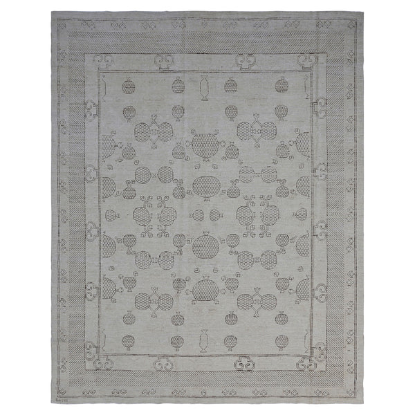 Elegant monochromatic area rug with floral and geometric medallion pattern.