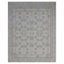 Elegant monochromatic area rug with floral and geometric medallion pattern.