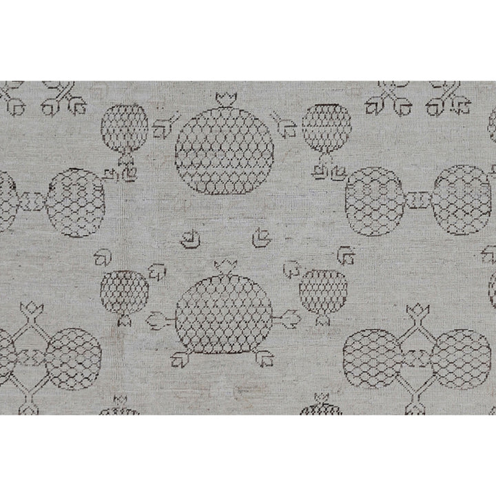 Elegant monochromatic fabric with stylized fruit pattern and abstract details.