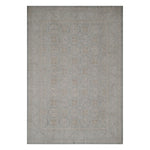 Rectangular area rug with elegant geometric and floral pattern design.