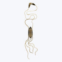 Metallic pendant with architectural design features gold wavy chain.