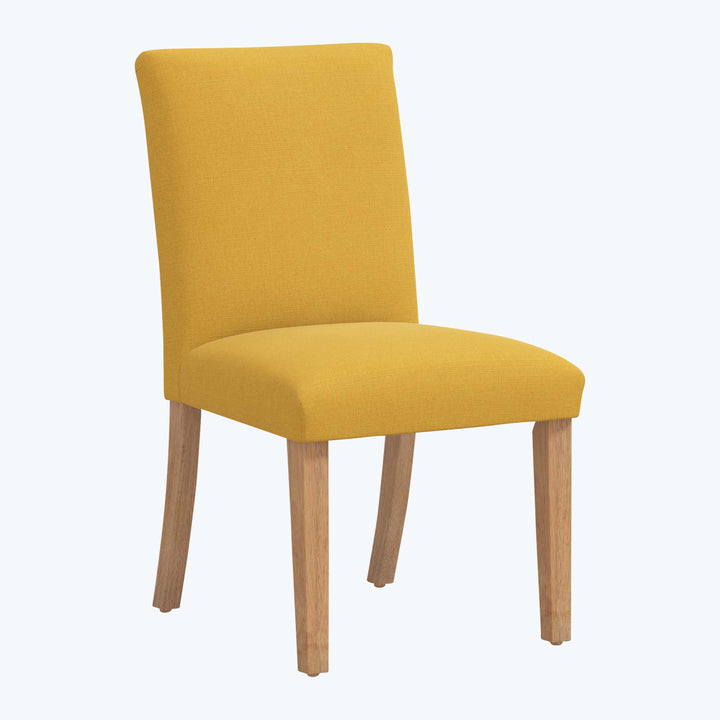 Modern mustard yellow dining chair with high back and cushioned seat