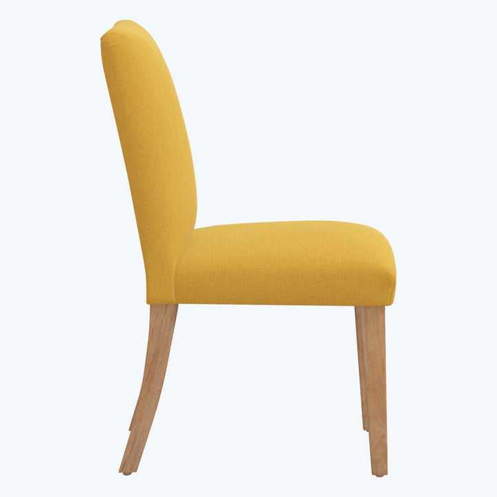 Sleek modern dining chair with vibrant yellow upholstery and wood legs