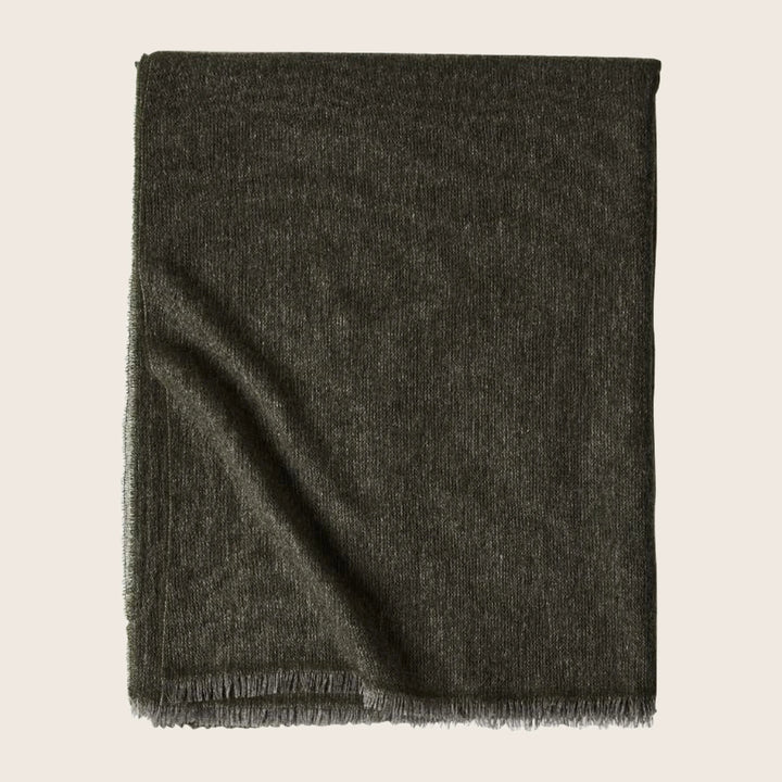 Dark gray fabric with fine texture, fringed edges, versatile design.
