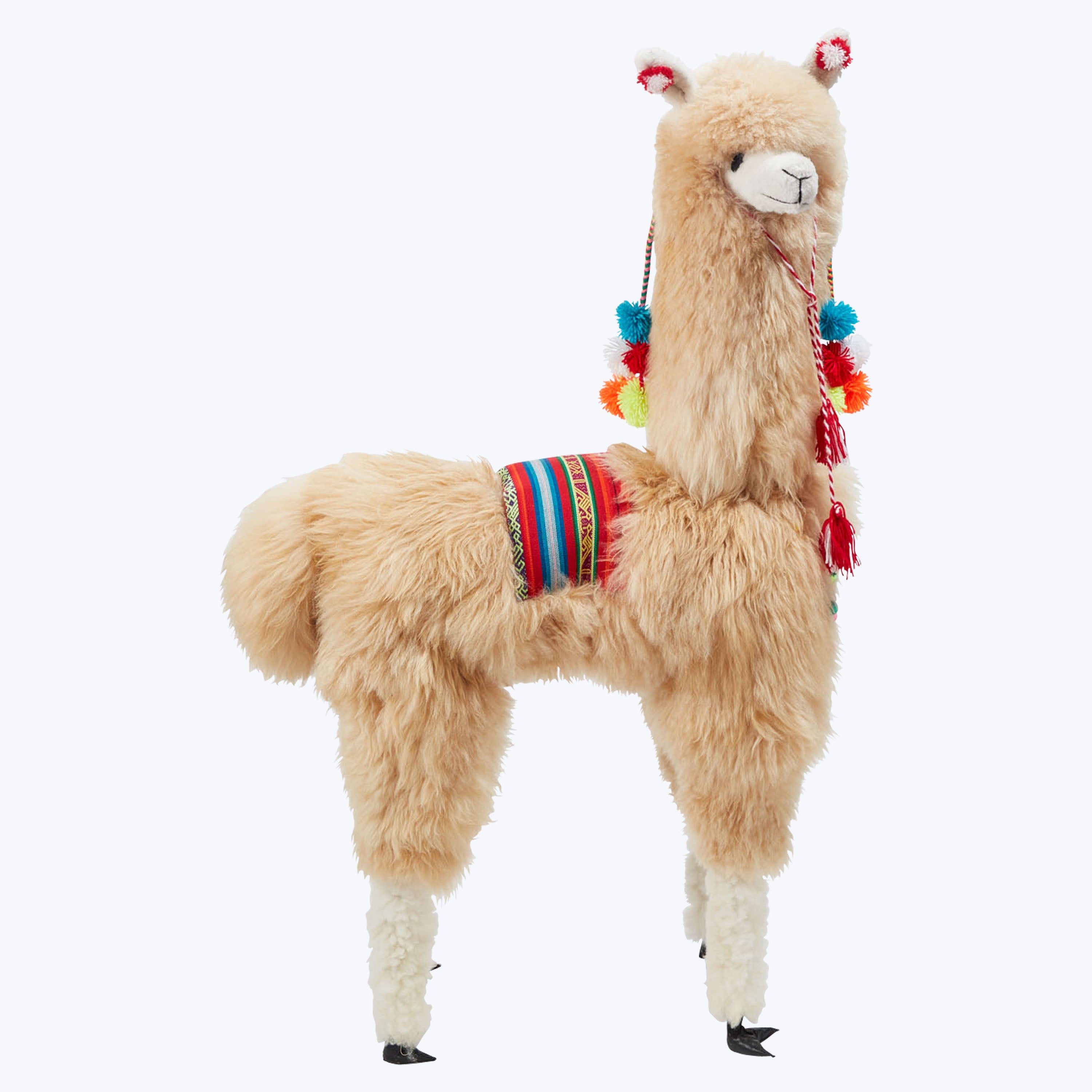 Colorful llama plush toy decorated in festive South American style.