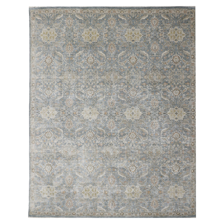 Vintage-style rectangular area rug with ornate gray and beige pattern.