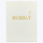 Minimalistic journal cover with 'BUBBLY' in gold, bubble accents.