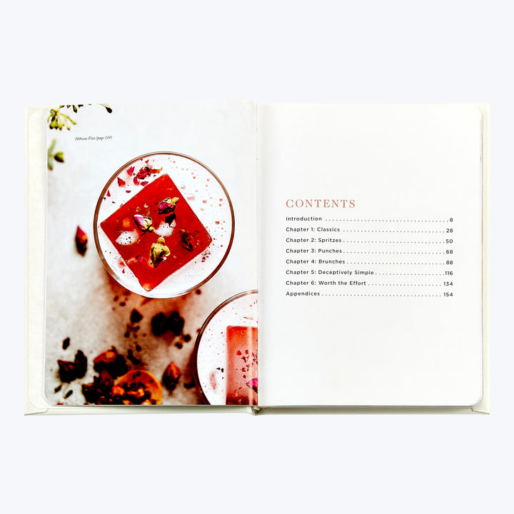 Vibrant cookbook with drink recipe and organized table of contents.