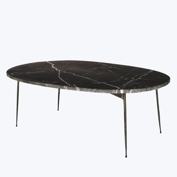 Modern oval coffee table with marble-effect top and metal inlay.