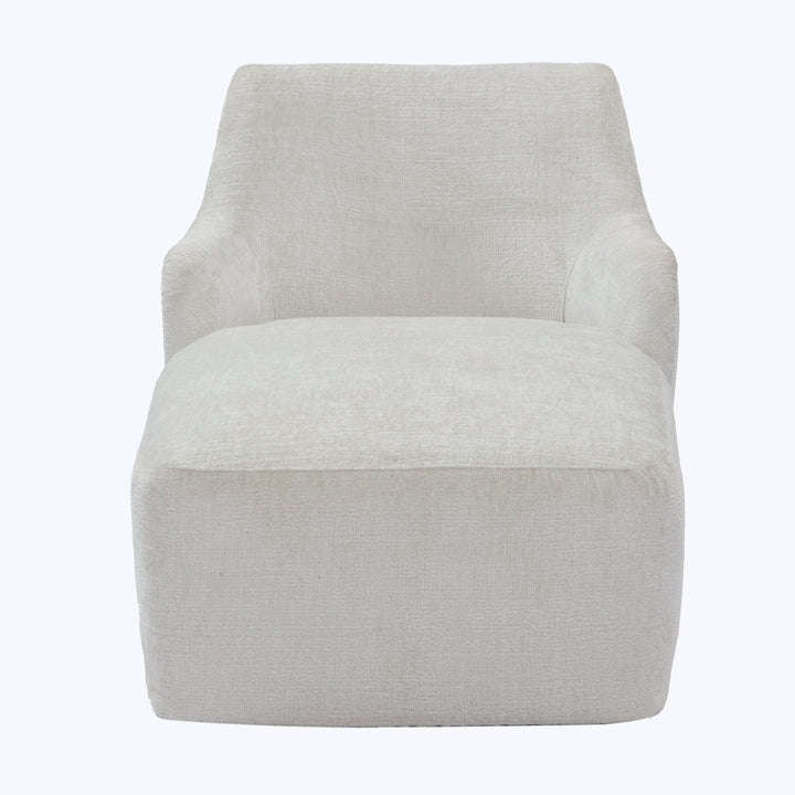 Modern armchair with simplistic design, light fabric upholstery, square form.