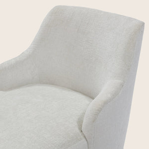 Modern armchair with simplistic design, light fabric upholstery, square form. - hover