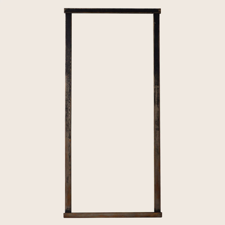 Minimalist rectangular mirror with dark metal frame, industrial/rustic aesthetic.