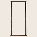 Minimalist rectangular mirror with dark metal frame, industrial/rustic aesthetic.