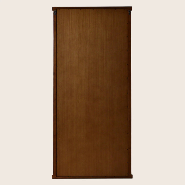 Tall wooden door with subtle gradient, visible hinges, isolated on white.