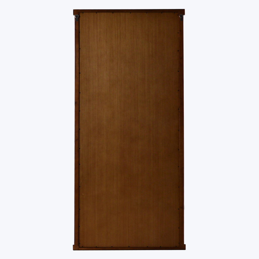 Tall wooden door with subtle gradient, visible hinges, isolated on white.