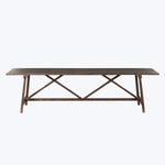 Rectangular wooden coffee table with X-shaped legs in rustic style.