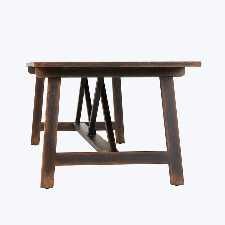 Dark-stained wooden bench with unique X pattern design on legs.