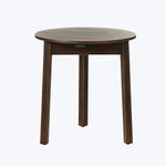 Dark stained round wooden table with textured finish and straight legs