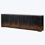 Distressed dark wood sideboard with four doors and round knobs.