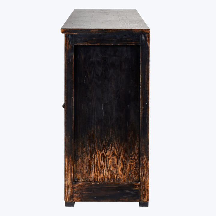 Dark stained wooden cabinet with single door and simple knob.
