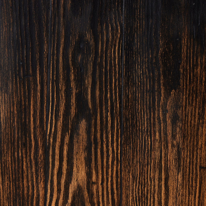 Close-up of dark wood texture with visible grain and lighting.