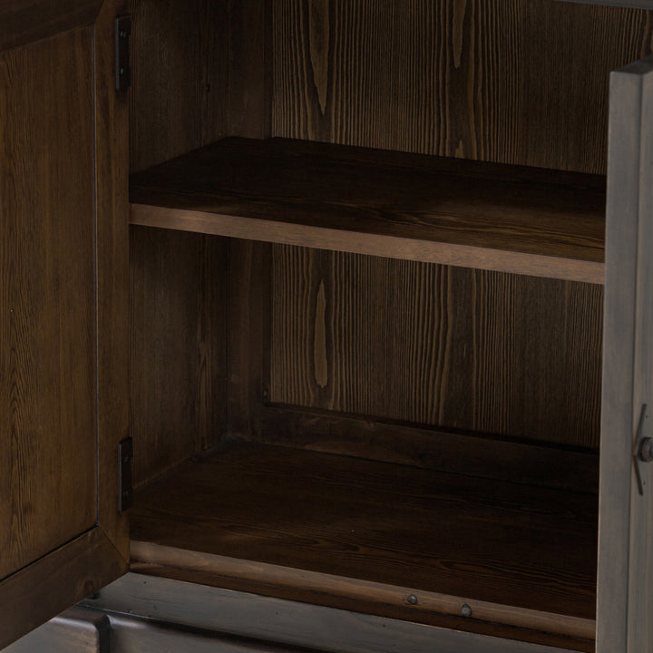 Close-up of empty wooden cabinet with dark finish and shelves.